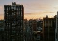 prédios em cidade grande impede de ver o por do sol